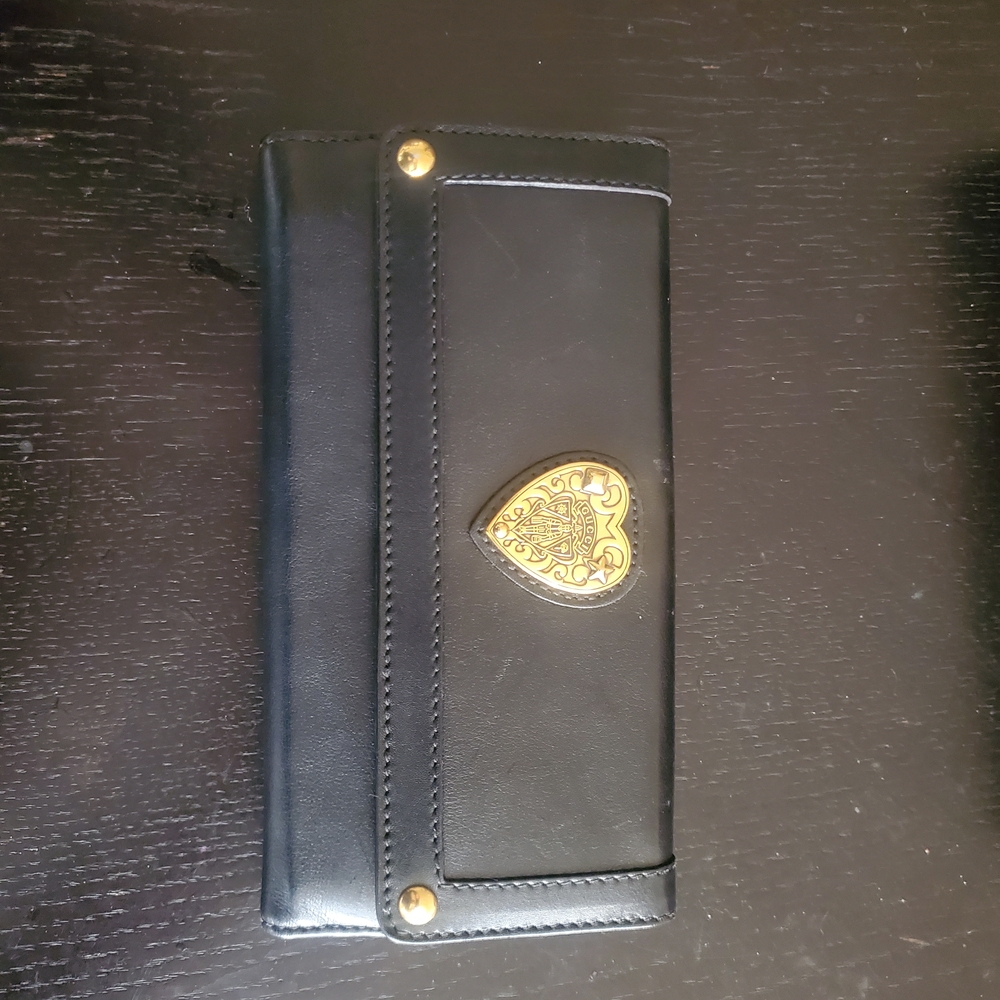 Gucci Elegant Black Wallet with Gold Accents